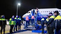 Watch: An inside look at a garda charter deportation of 52 Georgian nationals