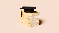 Stack of Blank Yellow Books Topped with Graduation Cap – Knowledge and Academic Achievement Concept