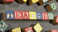 Teacher Spelled in children’s blocks
