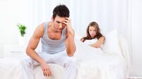 Young couple having relationship difficulties in the bedroom