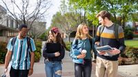 Diverse College Students Walking on Campus