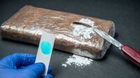 Positive cocaine test result in seized drug package from police trafficking operation.