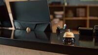 Hotel Reception Desk with Vintage Silver Bell